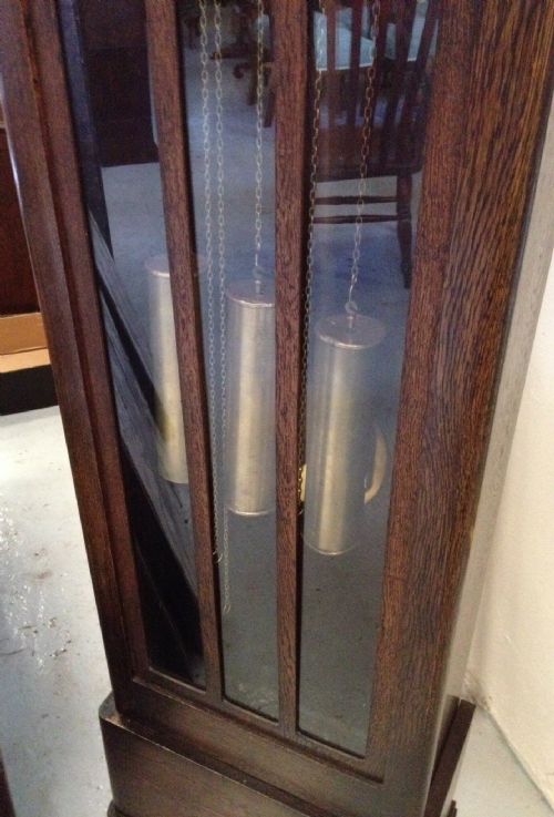 fig 1. Oak cased Art Deco three weight long case clock