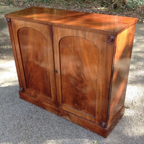 Late Regency Two Door Cabinet with Flame Mahogany Doors
