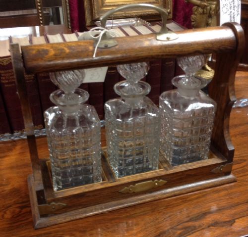 Edwardian Oak Tantalus with Original Bottles and Key