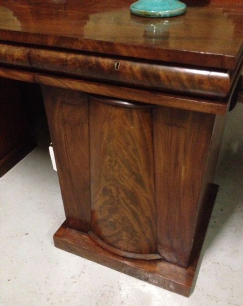 fig 1. Late Regency flame mahogany twin pedestal sideboard