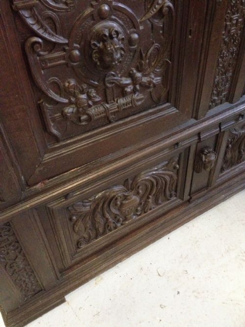fig 2. Antique beautifully carved oak ecclesiastical cupboard over drawers
