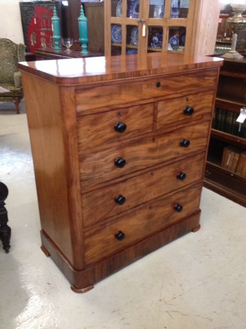 fig 1. Victorian faded mahogany five height chest of drawers with ebonised knobs
