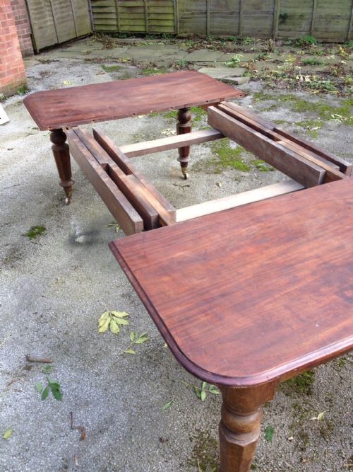 fig 1. Eight to ten seater Georgian mahogany extending dining table with two original leaves for restoration
