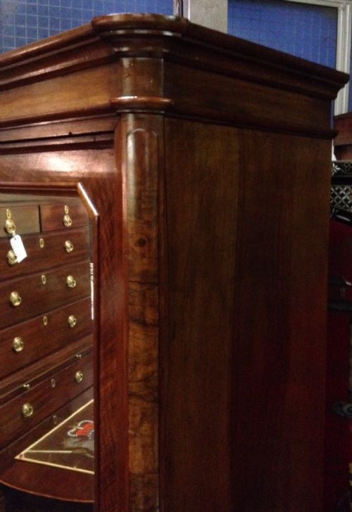 fig 1. Nineteenth century walnut armoire with mirrored door