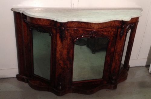 fig 1. Burr wanut credenza with white Carrera marble top and mirrored doors