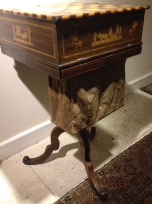 fig 1. Nineteenth century inlaid Italian games table on turned stem with tripod base