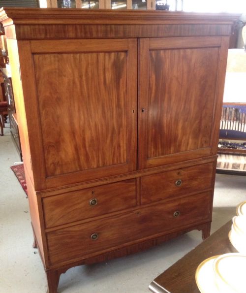 fig 1. Georgian mahogany clothes press of small size