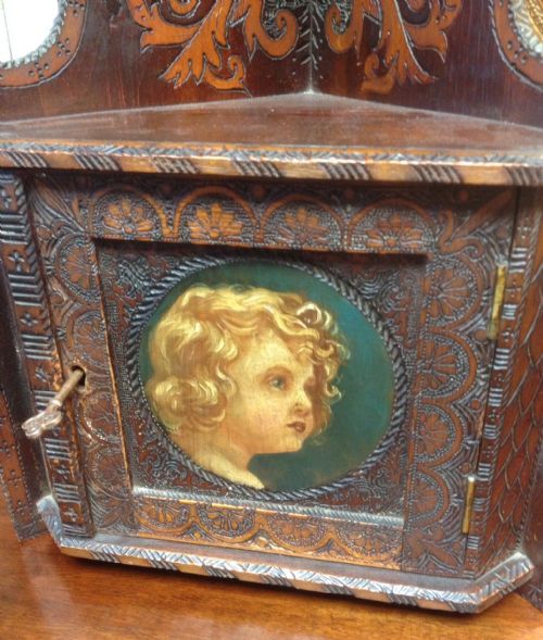 fig 1. Victorian hand painted and carved hanging corner cupboard