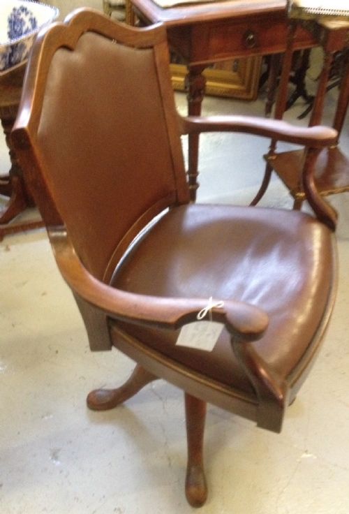 fig 1. Swivel and height adjusting desk chair circa 1920