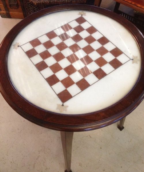 fig 1. Mahogany arts and crafts marble topped games table inlaid with mother of pearl