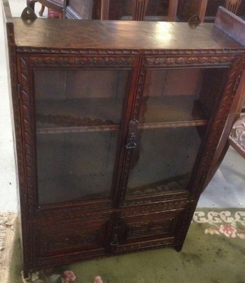 Carved Oak Glazed Bookcase of Small Proportions