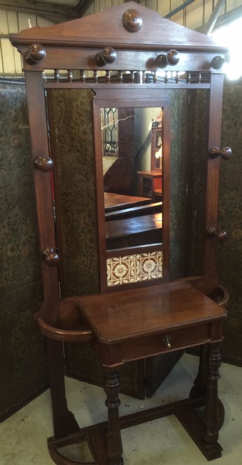 fig 1. Victorian walnut hall stand with tiled back and original trays circa 1880