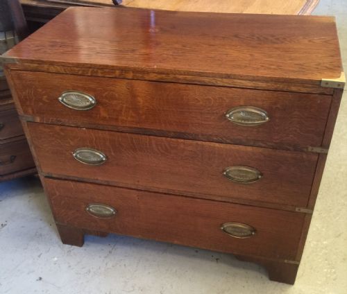 fig 1. Antique military style oak chest of three drawers