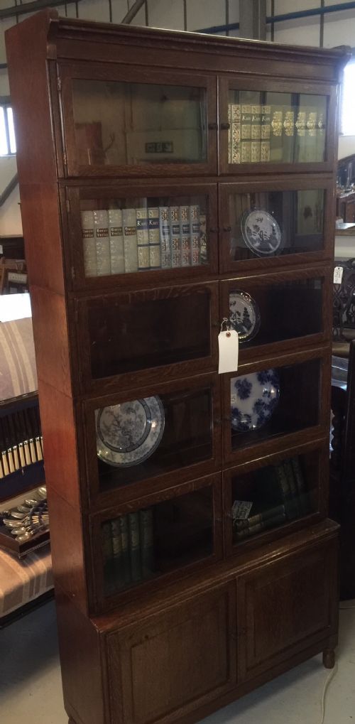 fig 1. Antique solid oak Minty stacking six height bookcase ( one of a pair)