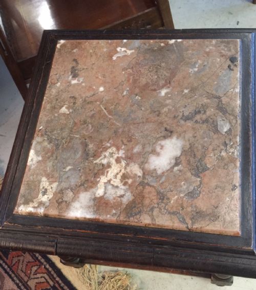 fig 1. Marble topped oak stand on turned legs