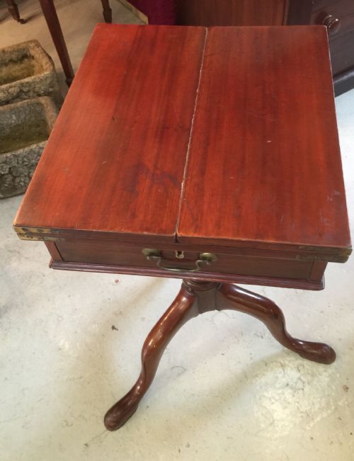 fig 1. George Third mahogany writing table on tripod base