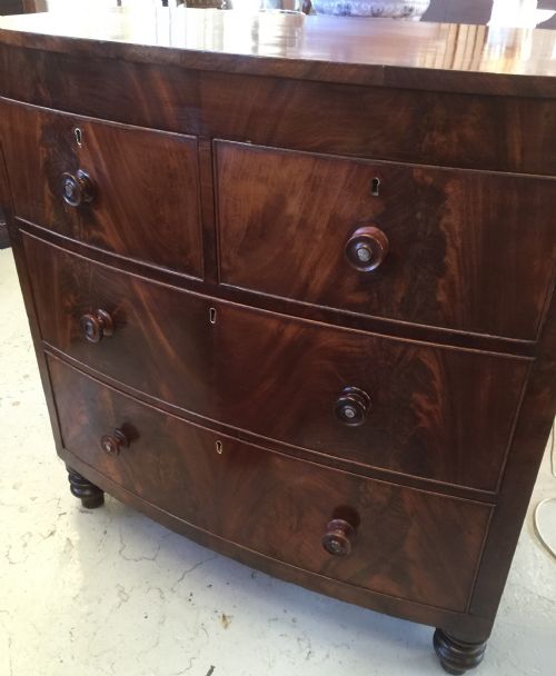 fig 1. Early Victorian flame mahogany bow front chest of drawers 