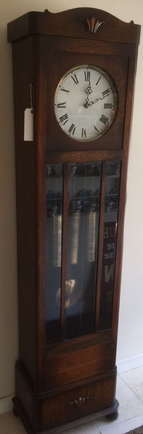 fig 1. Art Deco oak triple brass weight longcase clock