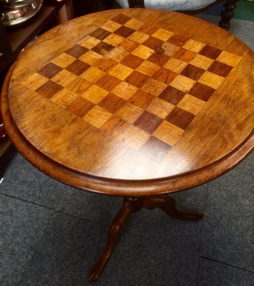 fig 1. Victorian walnut games table on tripod base circa 1880