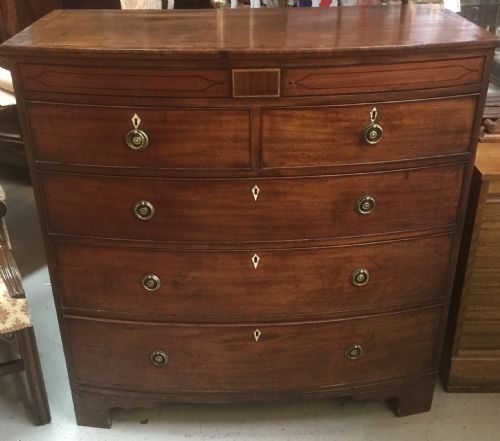 fig 1. Georgian mahogany bow front chest of drawers