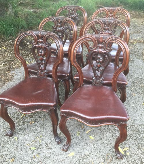 Six Victorian Carved Balloon Back Dining Chairs