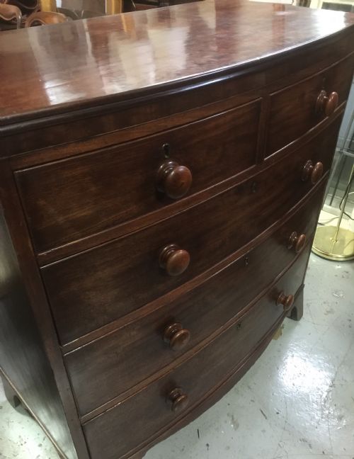 fig 1. Georgian mahogany bow front chest on splayed feet 