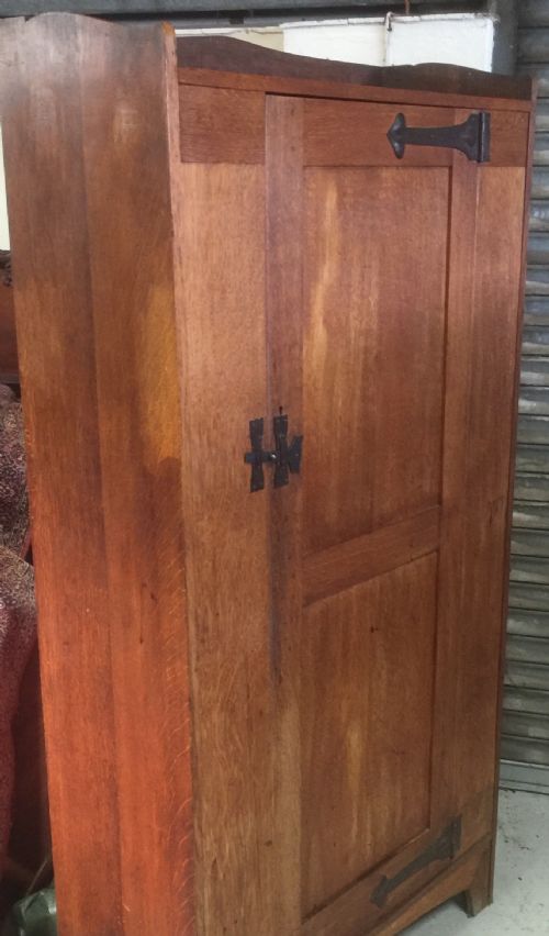 fig 1. Arts and crafts golden oak hall cupboard circa 1900