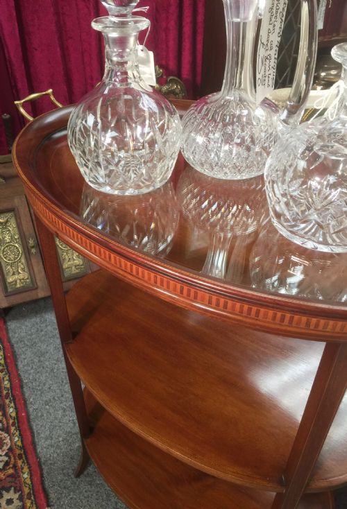 fig 1. Edwardian inlaid mahogany oval tray topped etagere