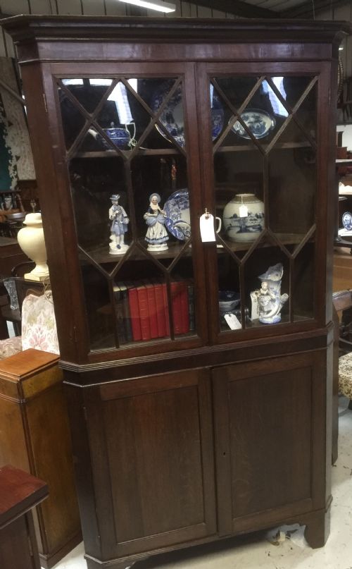 fig 1. Georgian oak and mahogany glazed corner cupboard circa 1750