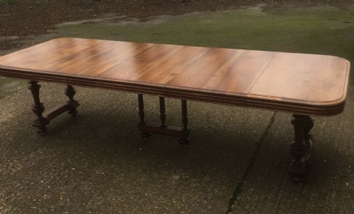 fig 1. Antique 12 seater extending walnut dining table