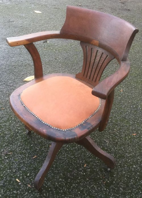 fig 1. Oak revolving desk chair leather seat circa 1920