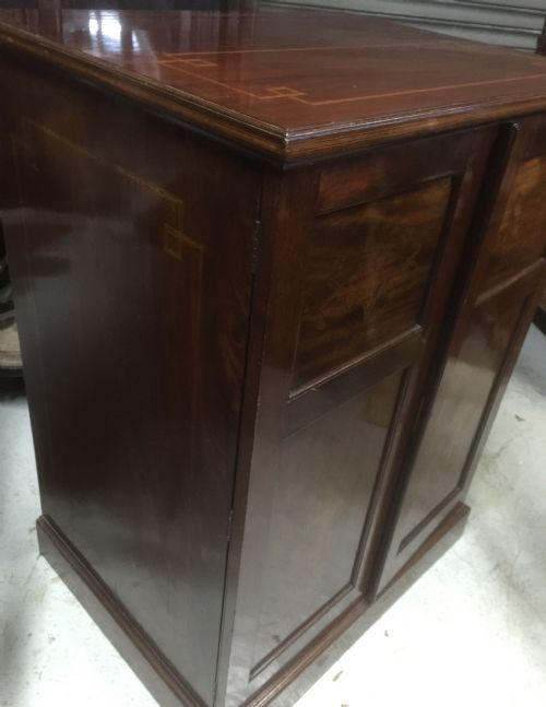 fig 1. Small Victorian inlaid mahogany clothes press
