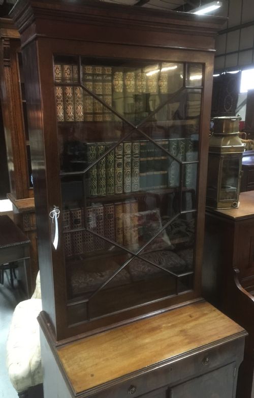 fig 1. Narrow Victorian glazed mahogany bookcase over cupboard