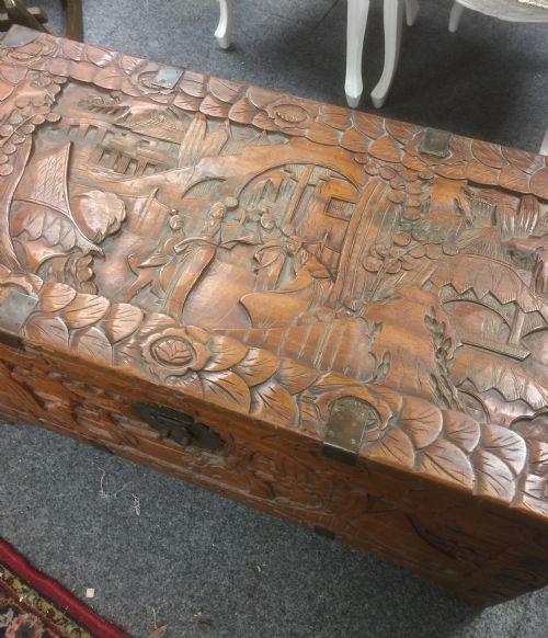 fig 1. Carved oriental brass bound camphor wood chest