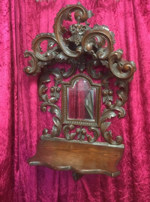 Black Forest Carved Mirror and Bracket Nineteenth Century