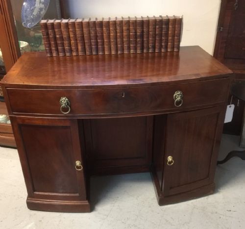 Nineteenth Century Bow Front Flame Mahogany Desk