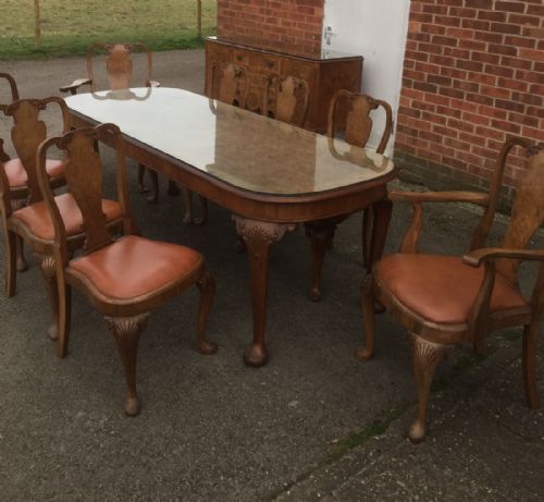 Burr Walnut Eight Seater Table Eight Chairs and a Sideboard Circa 1920