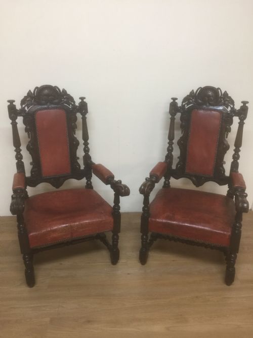 Pair of Carved Oak Baronial Chairs in Original Distressed Leather