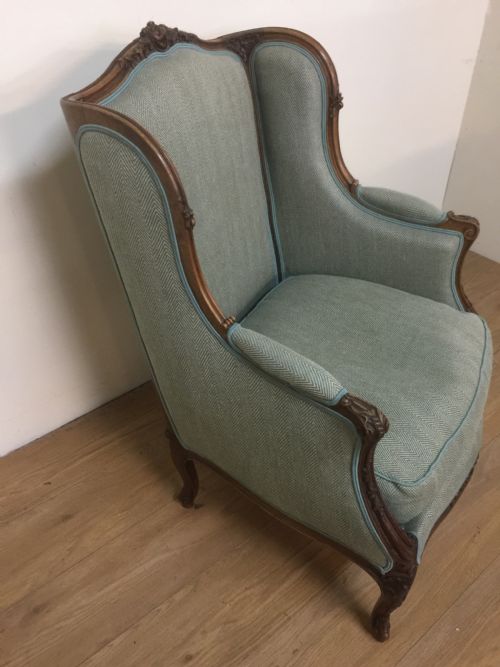 Nineteenth Century French Carved Walnut Winged Armchair