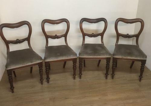 Four Nineteenth Century Mahogany Balloon Back Chairs