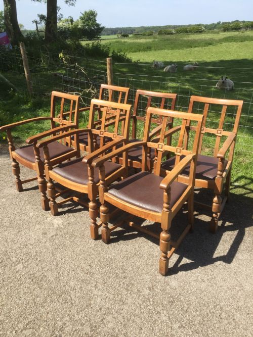 Six Golden Oak Arts and Crafts Armchairs