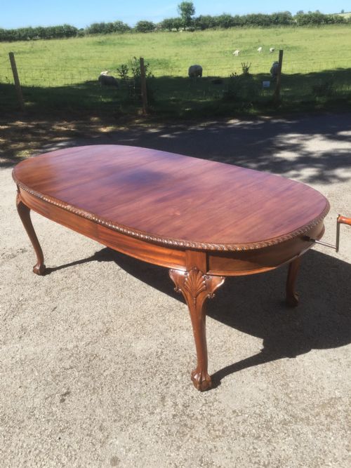 Edwardian Eight Seater Walnut Wind Out Dining Table on Cabriole Legs