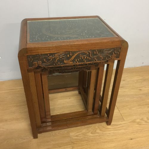 Chinoiserie Hardwood Nest of Four Tables with Relief Carved Dragon Decoration to the Top and Frieze