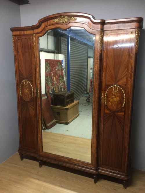 French Inlaid Ormolu Mounted Armoire.