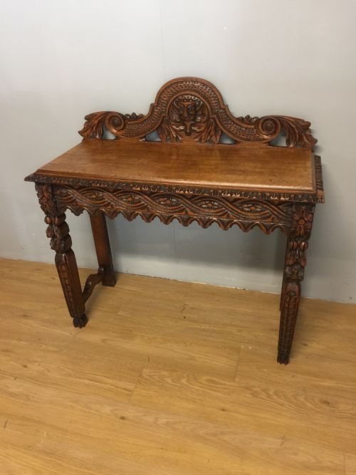 Nineteenth Century Carved Solid Oak Console Table with Green Man Mask