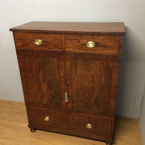 Nineteenth Century Flame Mahogany Clothes Press of Small Proportions