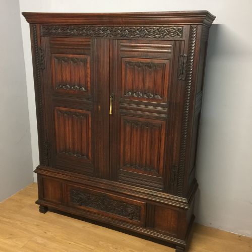 Arts and Crafts Solid Oak Hall Cupboard with Linen Fold Panels