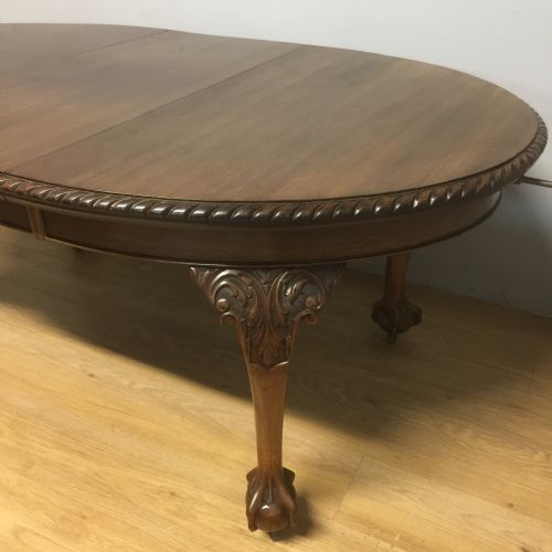 fig 1. Nineteenth century Queen Anne style mahogany wind out dining table