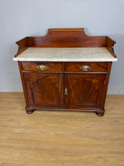 Nineteenth Century Flame Mahogany Marble Topped Side Cabinet