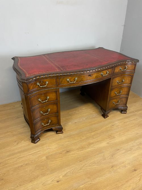 Serpentine Sided Chippendale Style Mahogany Desk with Inset Leather Top